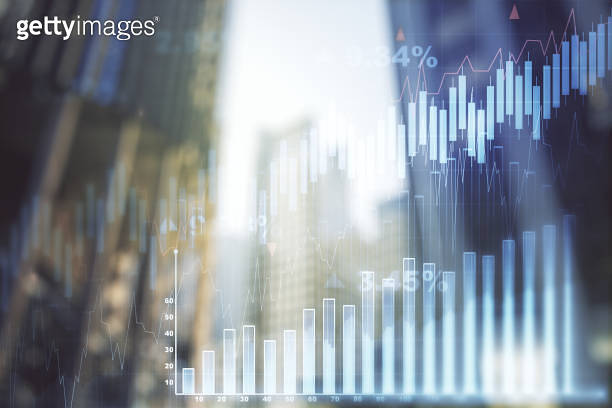 Multi exposure of abstract financial graph on office buildings ...