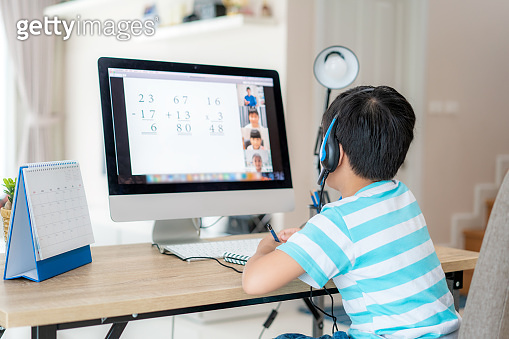 Asian boy student video conference e-learning with teacher and ...