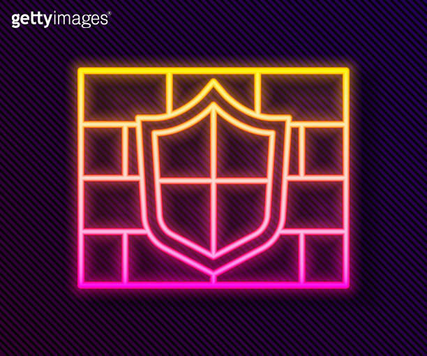 Glowing neon line Shield with cyber security brick wall icon isolated ...