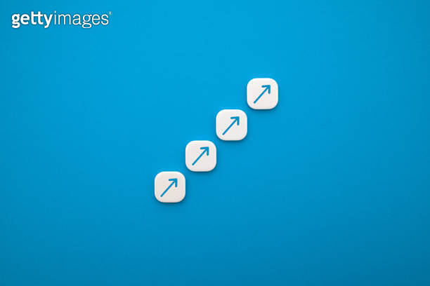 Blue Arrow Block Gradually Raising from Blue Background (1218378822 ...