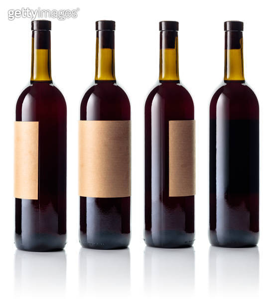 Red wine bottle with old paper label isolated on white. 이미지 (1202533916