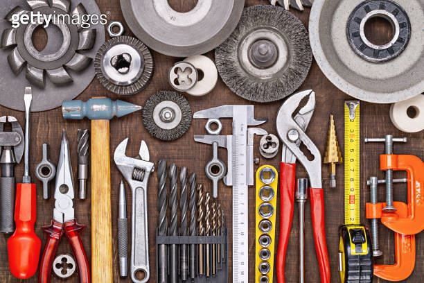 View Tool Set of repair tools, DIY on brown wooden background, top view. Tools ...