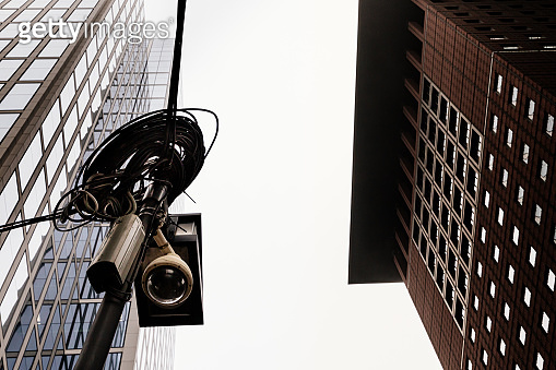 Curated visual reference: Visual Reference: Surveillance Camera In The City With High Rise Buildings In