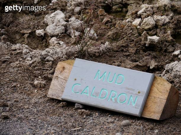 Side view of a wooden sign at the mud cauldron, one of the top ...