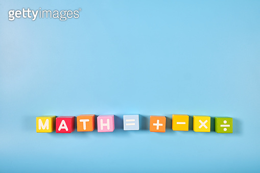 Flat lay, Top view of bright colored Math symbols on wooden blocks on ...