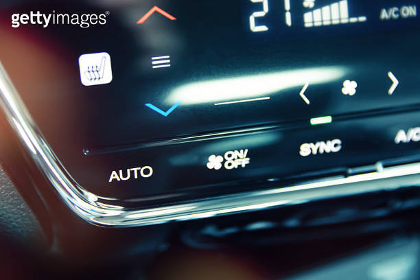 Automatic air conditioning touch panel and close-up to AUTO button ...