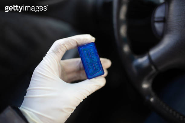OBD2 bluetooth scanner for a car, connecting with a smartphone ...