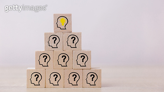 Arranging wood block stacking with icon head human symbol and light ...