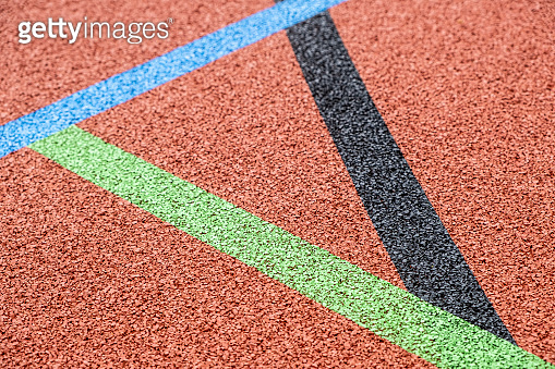 Polytan Background modern artificial surface of a polytan sports field with colored lines ...
