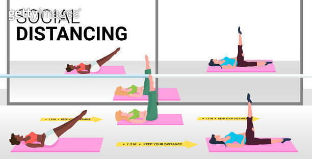 mix race women doing fitness exercises keeping distance to prevent ...