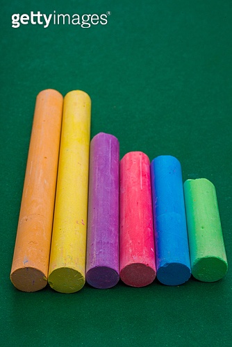 Six Chalks Six pieces of chalk, all of different size and bright colours lie ...