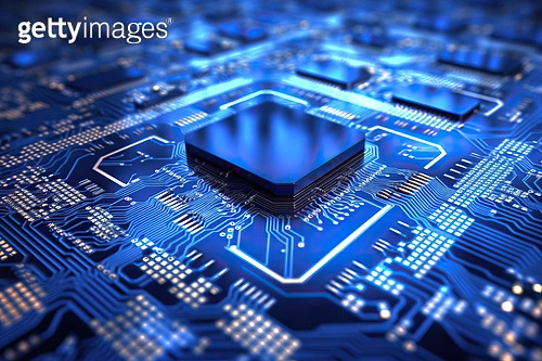 close up of a microchip circuit interior of a computer with neon lights ...