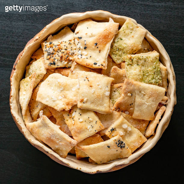 Homemade herbal healthy baked wheat vegan vegetarian cracker appetizer