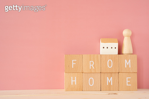 Working from home; Eight wooden blocks with "FROM HOME" text of concept ...