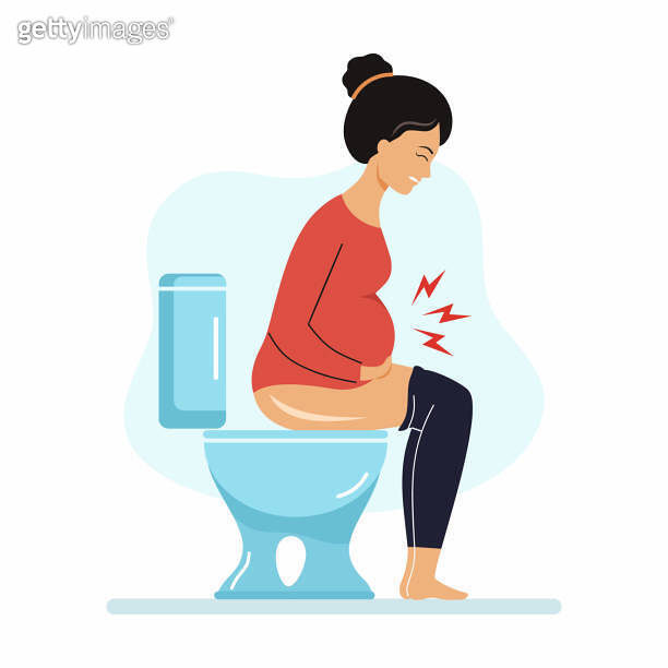 Pregnant woman is sitting on toilet. Constipation during pregnancy