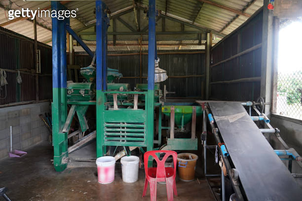 Small rice mill in Thailand community business industry in a small ...