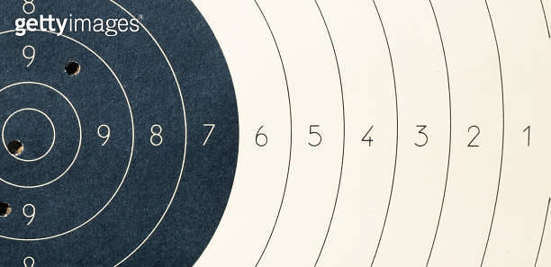 Target with numbers for shooting at a shooting range. A round target ...