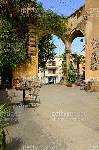 Asmara Theater / Cinema Asmara (1919) ivy and Renaissance arches