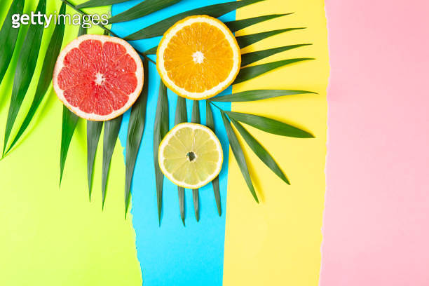 Colorful fruit tropical composition from fresh citrus, lemon, orange ...