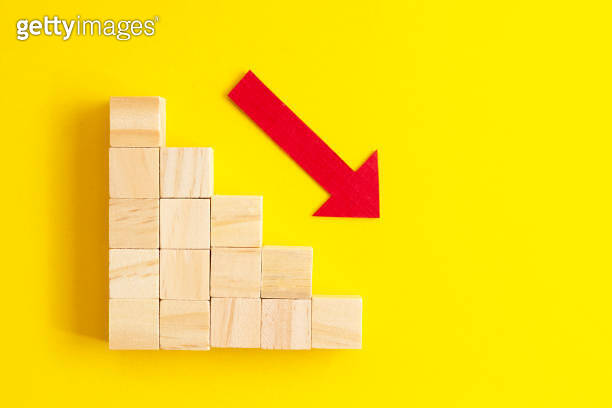Business decrease concept abstract yellow background. Red arrow and ...
