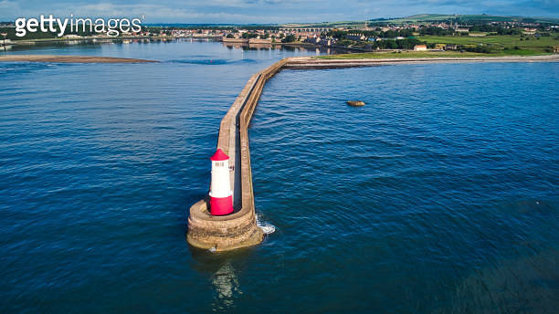 Aerial View Of Berwick Upon Tweed Concrete Breakwater And Lighthouse aerial-view-of-berwick-upon-tweed-concrete-breakwater-and-lighthouse