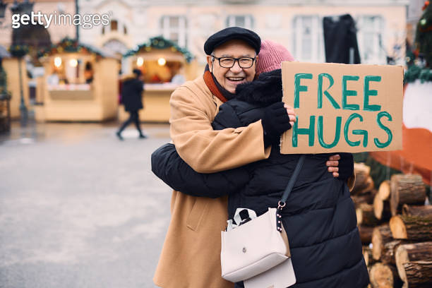 Hugging A Stranger Reach out and hug a stranger to brighten up their Christmas holidays ...