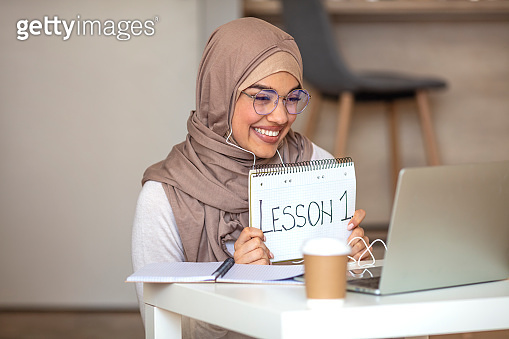 Smart Professor Smart professor at home, explaining math to students over video call ...