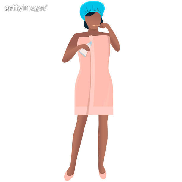 A girl after a morning or evening shower brushes her teeth. The concept