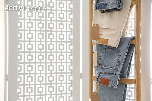 Jean Rack Country Room Rack with different new jeans in showroom. Space for text (1316769250 ...