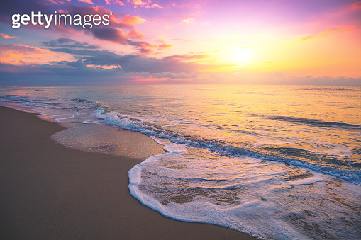 Seascape in the evening. Sunset over the sea with the beautiful blazing ...