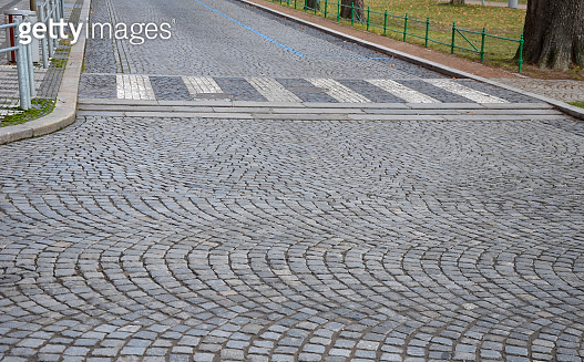 safety ramp for slowing down traffic to a residential street where ...