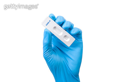 Rst Testing Kit Doctor hand with blue glove holding Rapid antigen test Rapid Strep Test ...