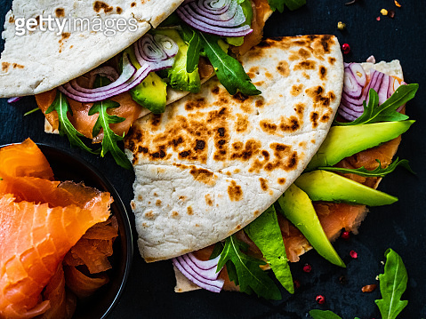 Italian piada wraps - piada stuffed with smoked salmon, avocado ...