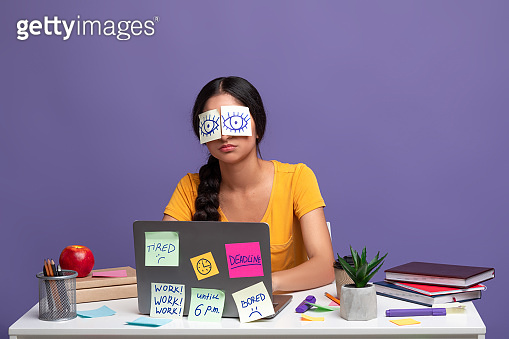 Tired woman sitting at desk with sticky notes on eyes 이미지 (1312614951 ...