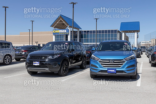 CarMax Auto Dealership used car display. CarMax is the largest used and ...