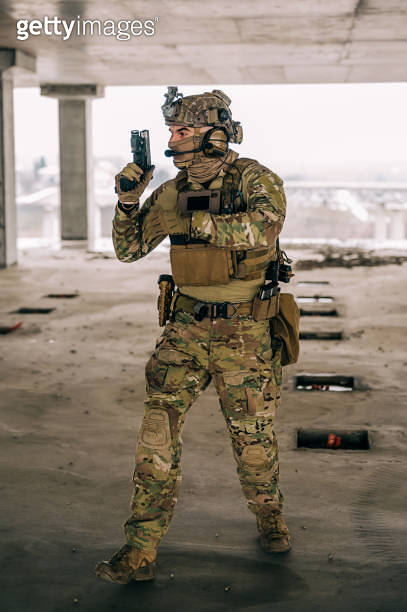 Special forces operator practice cqb tactics training with handgun ...