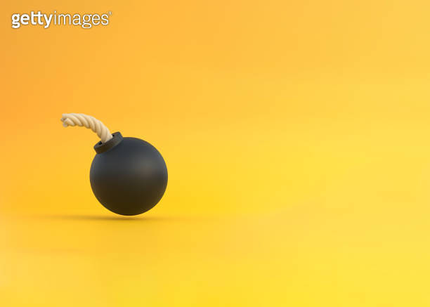 Stylized black spherical bomb isolated over yellow background 이미지 ...