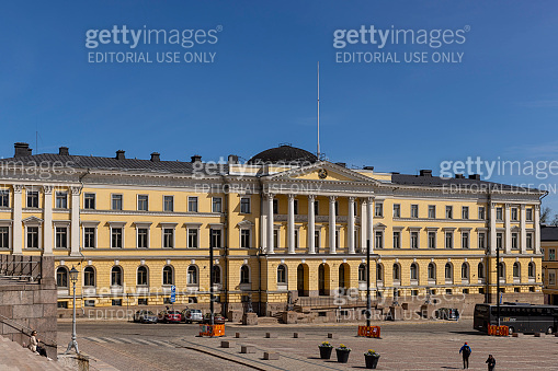 Finnish government building standing downtown Helsinki on a bright ...