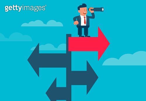 Businessman standing on tall street sign holding binoculars and looking ...