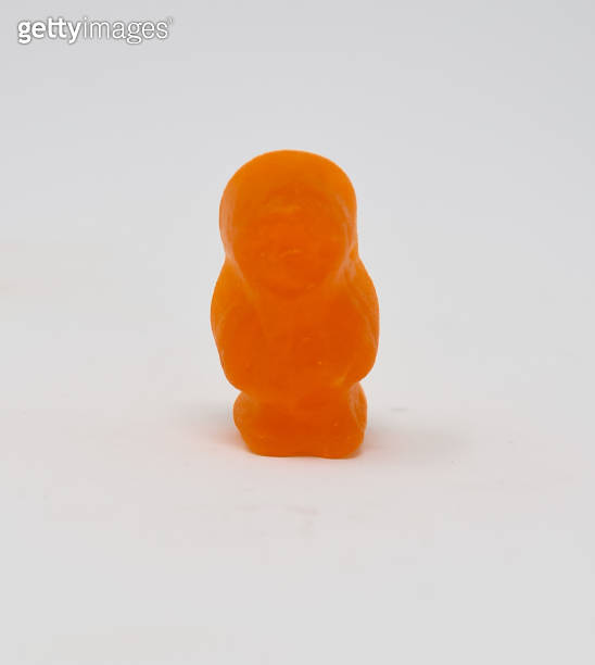 A close up photo of a Orange Jelly baby 이미지 (1371482500) 게티이미지뱅크