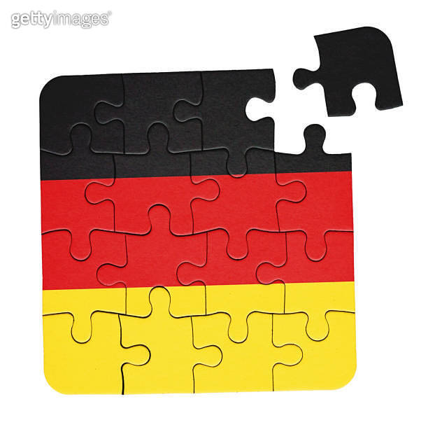 Puzzle of Germany: German national flag as a jigsaw with one last piece ...