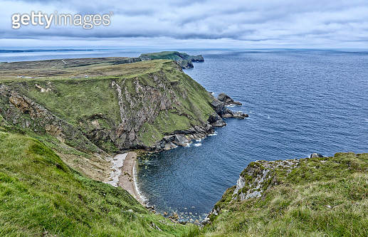 rock cliffs of Cnoc an Daim at the Atlantic coast of Ireland ...