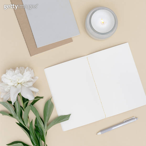 Flat lay, top view office table desk. Workspace with blank copybook