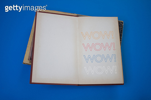 Wow word in opened book with vintage, natural patterns old antique ...