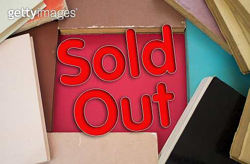 Sold Out word in opened book with vintage, natural patterns old antique ...