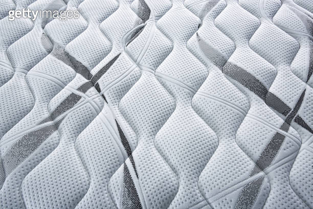 Closeup mattress texture background comfortable bed topper fabric bed ...