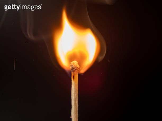 Burning match on a black background. Flame from a lit match. 이미지 ...
