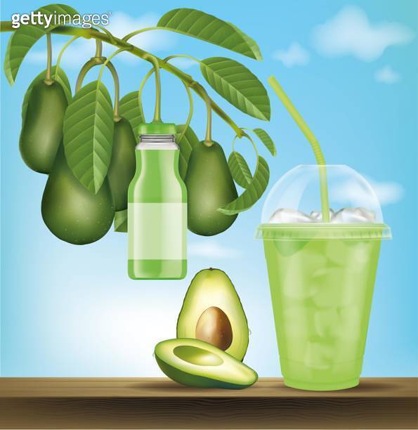 Avocado in a plastic glass with a branch of a avocado with a avocado