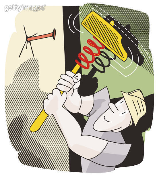 worker hammering nails into a wall with a spring hammer 이미지 (1818511188