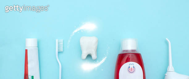 Close up of a toothbrush, toothpaste, irrigator, mouthwash for teeth ...